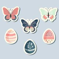 Spring stickers  butterflies and easter eggs. Hand drawn style. Springtime element. Vector seasonal element.