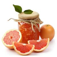 AI generated Tangy grapefruit jam marmalade jelly preserves in a glass jar, accompanied by fresh grapefruits, presented on a clean white backdrop, Ai Generated. photo