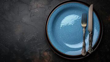 AI generated An elegant plate with knife and fork arranged tastefully on a sophisticated dark background, Ai Generated. photo