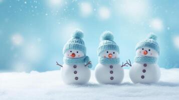 AI generated Charming knitted snowmen nestled on soft snow against a serene blue backdrop, evoking winter wonder. Ai Generated. photo