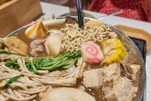 Chinese hot pot and exclusive wok. One-person hot pot is typical in hot pot shops photo