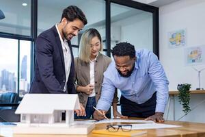 Team of architecture and businessmen discussing and brainstorming on floor plan modification for real estate investment and housing development project photo