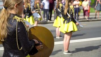 Ternopil, Ukraine July 31, 2020. Young girls drummer at the parade. Street performance video
