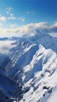 ai generado montaña majestad panorámico Nevado ver desde el parte superior de montañas vertical móvil fondo de pantalla foto