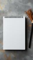 AI generated Modern workspace White notebook placed on a textured gray surface Vertical Mobile Wallpaper photo