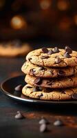 AI generated Indulgent treat Scrumptious chocolate chip cookies against dark backdrop Vertical Mobile Wallpaper photo