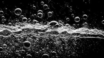 AI generated Soda water bubbles splashing underwater against black background. photo