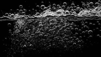 AI generated Soda water bubbles splashing underwater against black background. photo