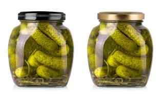 Set of Pickled cucumbers in glass jars on a white background with clipping path photo