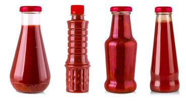 Set of Bottles of Ketchup isolated on white background with clipping path photo