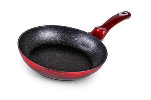 Red frying pan isolated on white background with clipping path photo