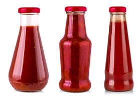 Set of Bottles of Ketchup isolated on white background with clipping path photo