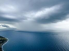 Downpour Cloudburst heads towards the coast photo