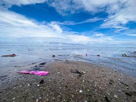 The view of the sea is beautiful, but unfortunately there is a lot of rubbish around the beach photo