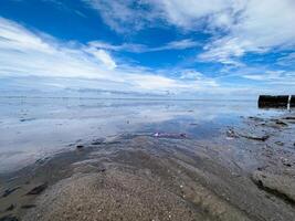 The view of the sea is beautiful, but unfortunately there is a lot of rubbish around the beach photo