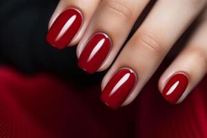 ai generado glamour mujer mano con clásico rojo uña polaco en su uñas rojo uña manicura con gel polaco a lujo belleza salón. uña Arte y diseño. hembra mano modelo. francés manicura. foto