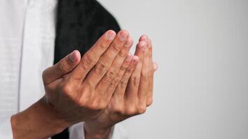 close up of man's hands praying photo