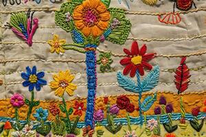 AI generated Mexican embroidery with cacti, flowers, birds, beads photo