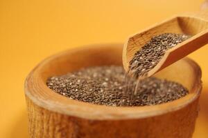 close up of chia seed in a container , photo