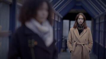 Lifestyle Portrait of Two Young Women Watching Tower Building Together video