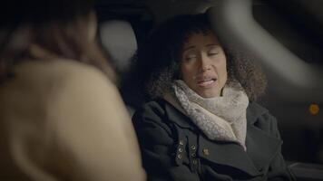 Female Friends Apologizing Forgiving Feeling Sorry Talking Together Inside Car video