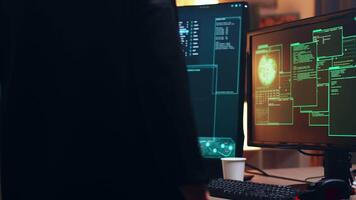 Girl hacker sitting at her super computer for cyber crimes using a dangerous malware. video