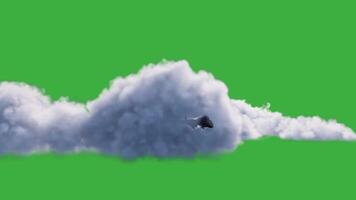 Fighter plane is flying through the clouds on green screen background video