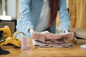 Small Business Owner Preparing Order for Shipment photo