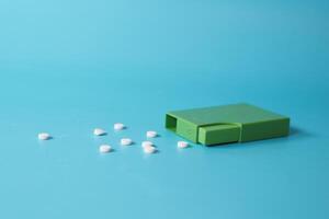 artificial sweetener container on table photo