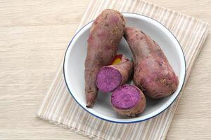 Steamed Purple Sweet Potatoes or ubi ungu photo