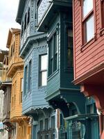 18 of April 2023 - Istanbul, Turkey - Traditional wooden colorful houses in Kuzguncuk district, Uskudar photo