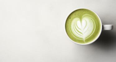 AI Generated Matcha Latte In White Cup. Top View Of Green Tea With Copy Space. Organic Vegetarian Milk Drink With Heart Shape Latte Art. photo