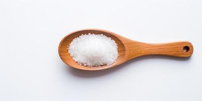 AI generated Sugar In Wooden Spoon On Light Background. Sea Salt, Healthy Food Ingredient. Top View Of White Granulated Cooking Ingredient. photo