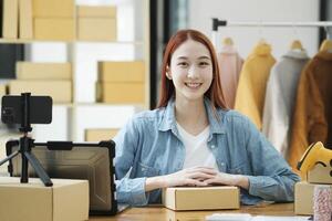 Confident woman portrait entrepreneur at ecommerce fashion or warehouse looking at camera. photo