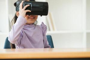 Child Delighted by Virtual Reality Experience photo