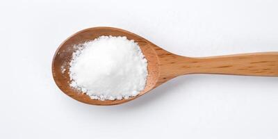 AI Generated Baking Soda In Wooden Spoon On Light Background. Top View Of Sodium Carbonate. Bicarbonate, Food Chemical Ingredient. photo