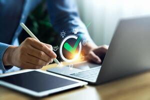 Business performance checklist, businessman using laptop doing online checklist survey, evaluation, online survey, digital form checklist, document control checklist, online survey photo