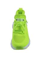 Green sneaker made of fabric on a white background photo