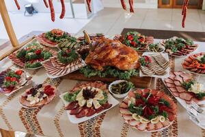 Meat and cheese snacks on the buffet. A buffet in a closed room, at a wedding celebration or birthday. Sandwiches on skewers before the start of the holiday. photo