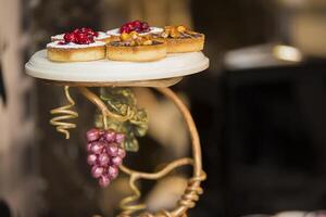 Bright cake on a beautiful dish photo