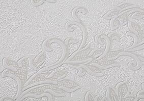 Background of light white paper wallpaper with a textured swirling pattern. photo