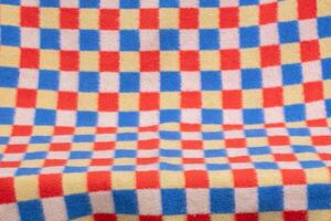 Blue, red and white checkered wool background. Checkered blanket. photo