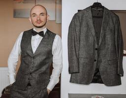 Portrait of a young groom at home before the wedding ceremony. A handsome man dressed in a classic suit. Male portrait. photo