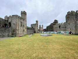 Caernarfon in Wales on the 11 August 2021. A view of Caernarfon Castle photo