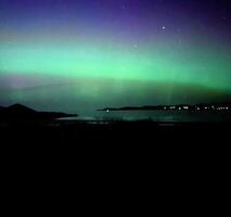 A view of the Northern Lights in Scotland photo