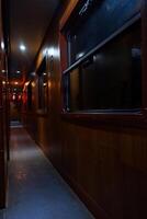 Inside an old sleep wagon of passenger train. photo