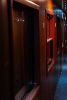 Inside an old sleep wagon of passenger train. photo