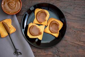 Argentine dulce de leche on toast on a plate. photo