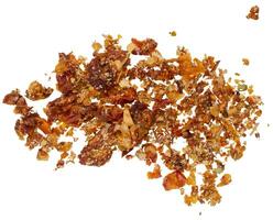 Chopped dried sun-dried tomatoes with salt on isolated background photo