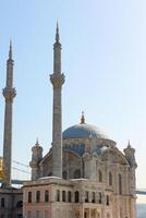 Ortakoy Mosque aka Buyuk Mecidiye Cami vertical photo. Travel to Istanbul concept. photo